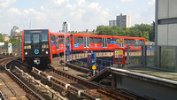 Canary Wharf bound DLR train pulling into West India Quay station